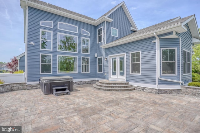 30780 Lindell Ln, Frankford, DE 19945 - back of property featuring a patio and a hot tub