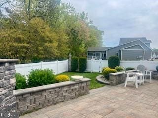 30780 Lindell Ln, Frankford, DE 19945 - exterior space featuring a fenced backyard and outdoor dining space