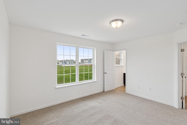 199 Holstein Dr Unit 117, Hanover, PA 17331 - unfurnished bedroom with carpet floors, baseboards, and visible vents