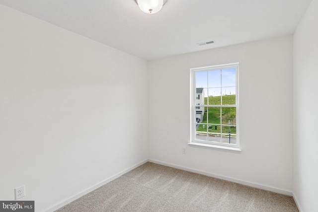 199 Holstein Dr Unit 117, Hanover, PA 17331 - carpeted spare room with visible vents and baseboards