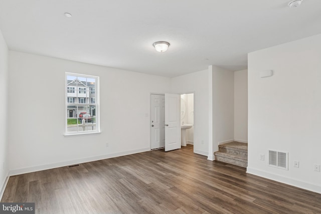 199 Holstein Dr Unit 117, Hanover, PA 17331 - unfurnished bedroom with baseboards, visible vents, and wood finished floors