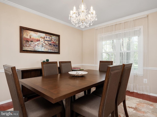 2322 Golden Chapel Rd, Odenton, MD 21113 - dining area featuring baseboards, ornamental molding, light wood-type flooring, and a notable chandelier