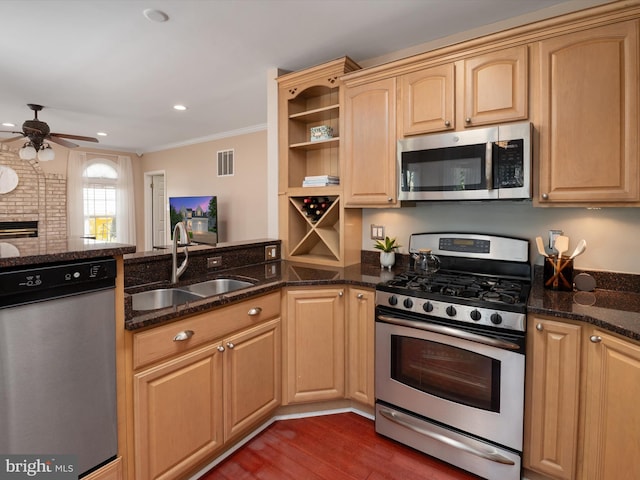 2322 Golden Chapel Rd, Odenton, MD 21113 - kitchen featuring visible vents, crown molding, ceiling fan, a sink, and stainless steel appliances