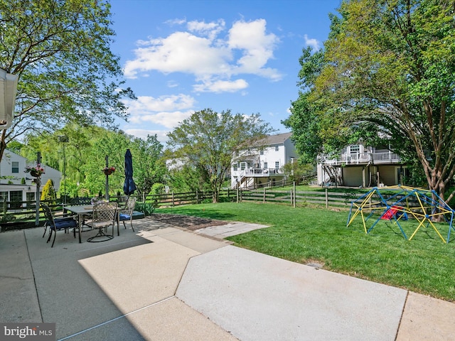 2322 Golden Chapel Rd, Odenton, MD 21113 - view of patio / terrace featuring fence and outdoor dining space