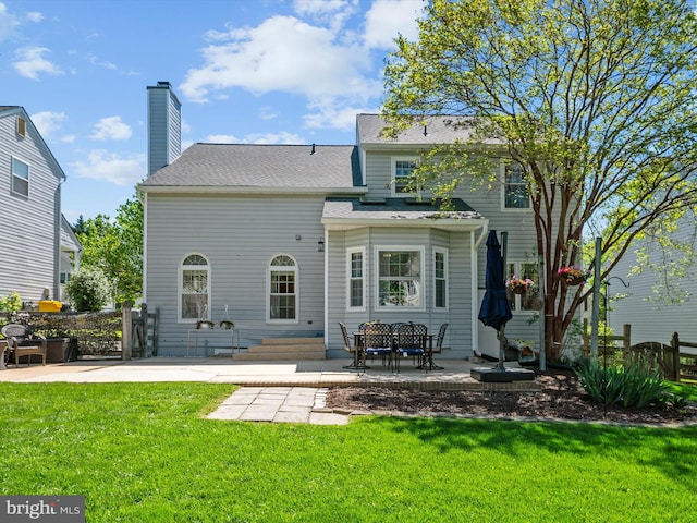 2322 Golden Chapel Rd, Odenton, MD 21113 - back of property with fence, a shingled roof, a patio area, entry steps, and a lawn