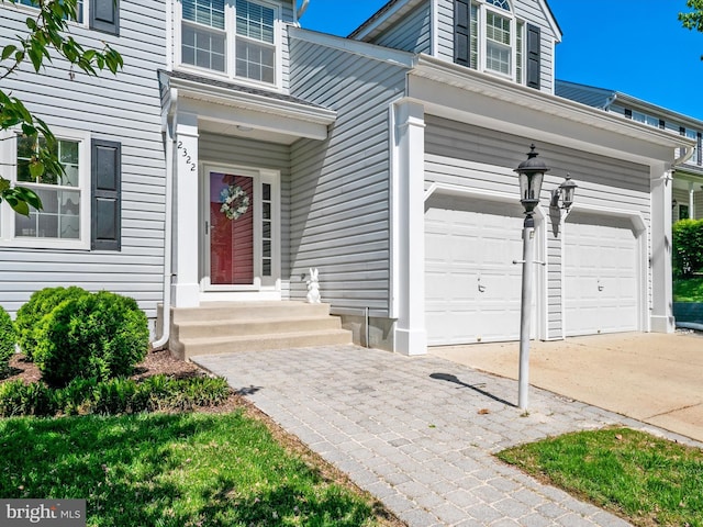 2322 Golden Chapel Rd, Odenton, MD 21113 - property entrance featuring concrete driveway and an attached garage