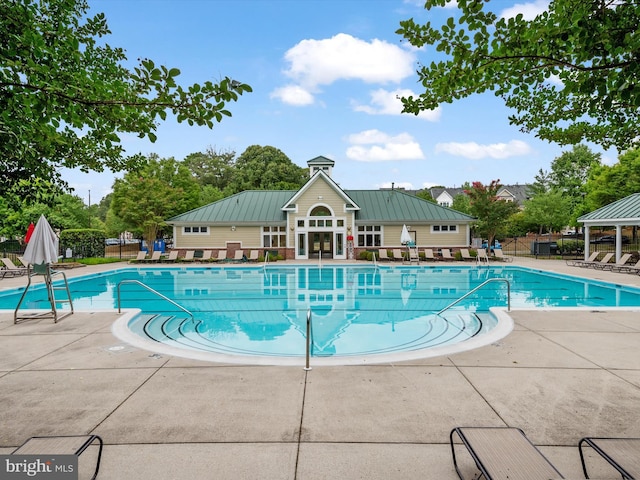 2322 Golden Chapel Rd, Odenton, MD 21113 - community pool with a gazebo, a patio area, and fence