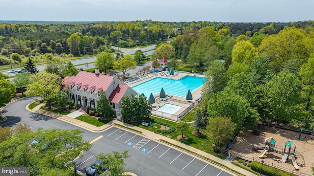 aerial view featuring a view of trees