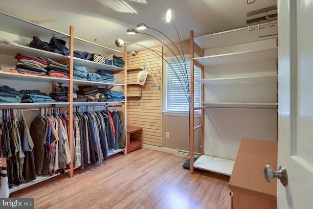 spacious closet with wood finished floors