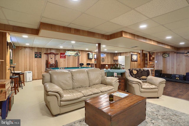 living room with wood walls, billiards, a paneled ceiling, and recessed lighting