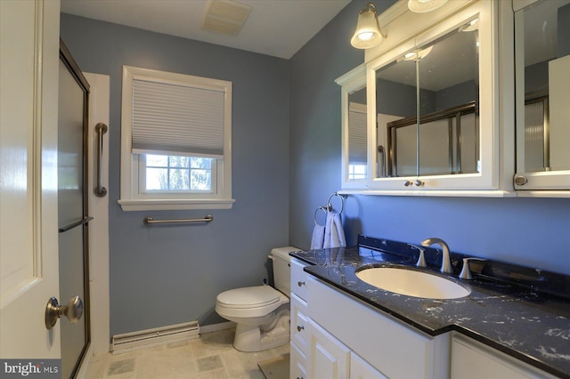 full bathroom featuring a baseboard radiator, toilet, vanity, baseboards, and a stall shower