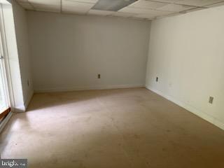 22 Morning Ct, Rosedale, MD 21237 - unfurnished room with baseboards and a drop ceiling