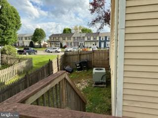 22 Morning Ct, Rosedale, MD 21237 - view of yard featuring fence, cooling unit, and a residential view