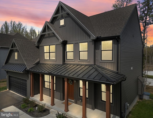 194 Cool Springs Road, North East, MD 21901 - view of front of home with a porch, a standing seam roof, a garage, board and batten siding, and roof with shingles