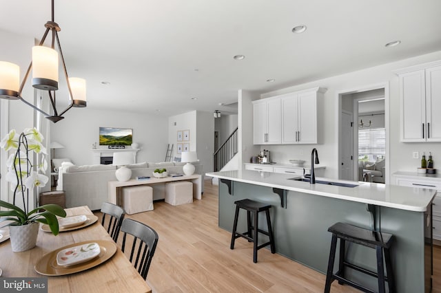 194 Cool Springs Road, North East, MD 21901 - kitchen featuring a sink, white cabinets, open floor plan, and light countertops