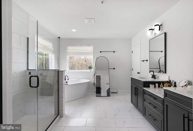 194 Cool Springs Road, North East, MD 21901 - bathroom with a sink, a shower stall, marble finish floor, double vanity, and a soaking tub