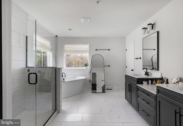 194 Cool Springs Road, North East, MD 21901 - bathroom featuring a shower stall, baseboards, vanity, a freestanding bath, and marble finish floor