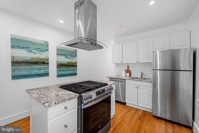 1524 5th St NW, Washington, DC 20001 - kitchen featuring a sink, appliances with stainless steel finishes, range hood, and light stone countertops