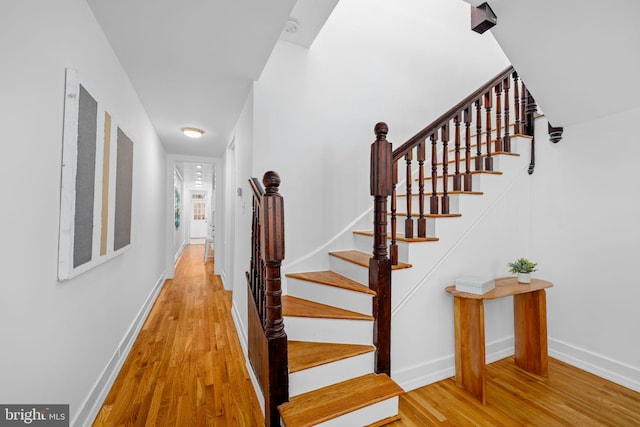1524 5th St NW, Washington, DC 20001 - stairway featuring baseboards and wood finished floors