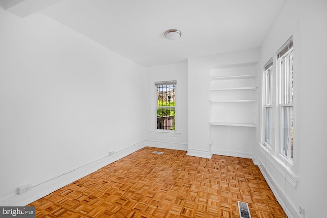 1524 5th St NW, Washington, DC 20001 - unfurnished room featuring baseboards and visible vents