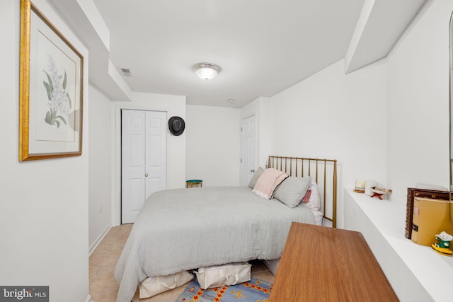 1524 5th St NW, Washington, DC 20001 - bedroom with a closet, baseboards, and visible vents