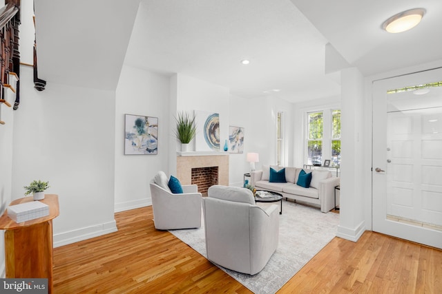 1524 5th St NW, Washington, DC 20001 - living area with recessed lighting, baseboards, light wood finished floors, and a fireplace