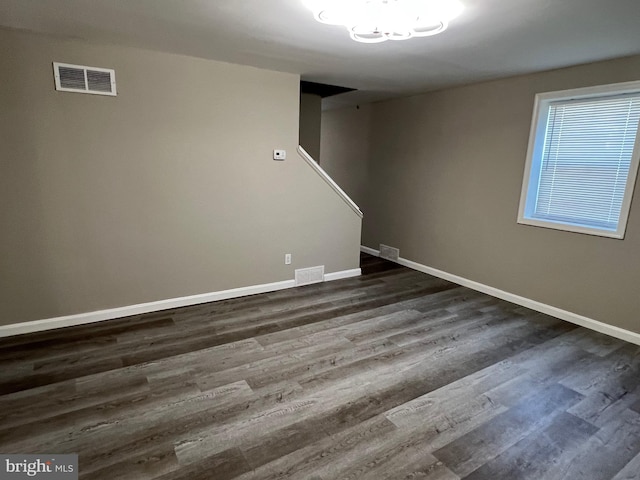 1948 Victory Dr, Baltimore, MD 21227 - interior space with baseboards, dark wood finished floors, and visible vents