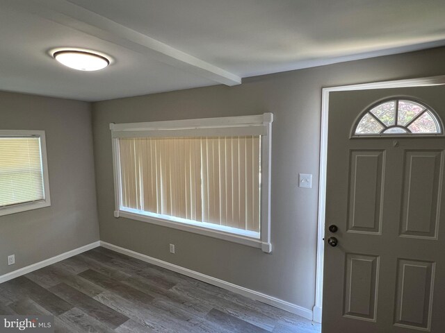 1948 Victory Dr, Baltimore, MD 21227 - foyer entrance featuring dark wood-style flooring and baseboards
