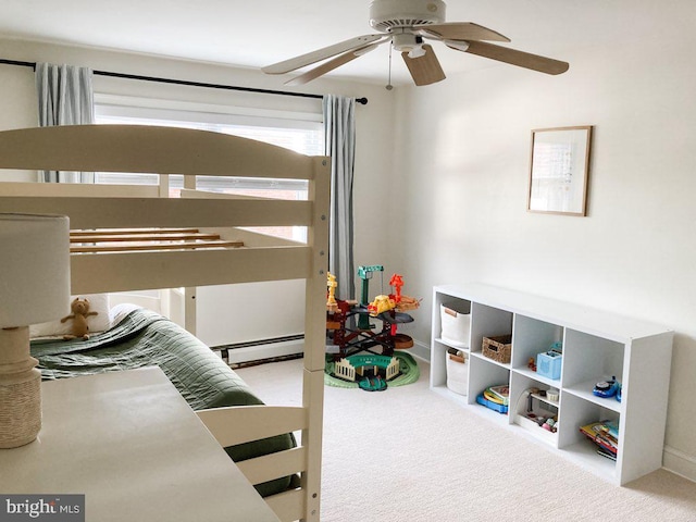 bedroom featuring carpet flooring, a ceiling fan, and baseboards