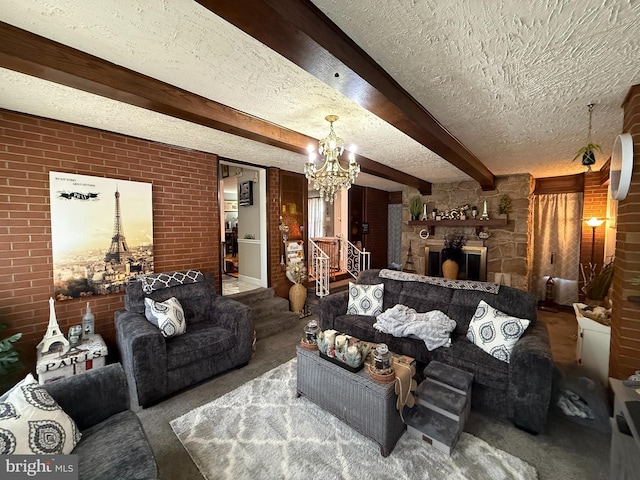 living area with beamed ceiling, brick wall, a notable chandelier, carpet, and a textured ceiling