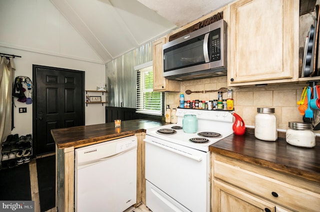 89 Cindys Way, Front Royal, VA 22630 - kitchen featuring decorative backsplash, butcher block counters, a peninsula, white appliances, and lofted ceiling with beams