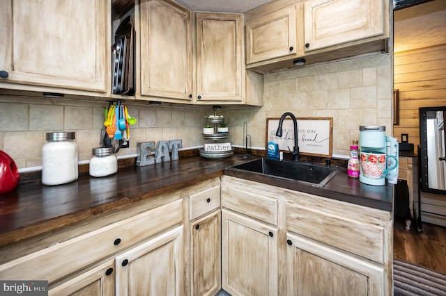 89 Cindys Way, Front Royal, VA 22630 - kitchen featuring a sink, wood counters, light brown cabinetry, and decorative backsplash