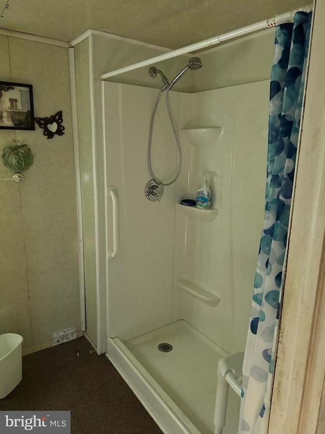 full bathroom featuring a stall shower