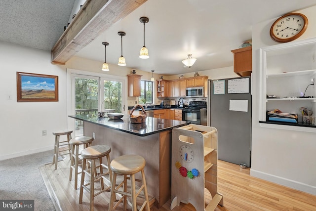 9601 Tinsmith Ln, Burke, VA 22015 - kitchen with open shelves, dark countertops, stainless steel microwave, and black range with electric stovetop