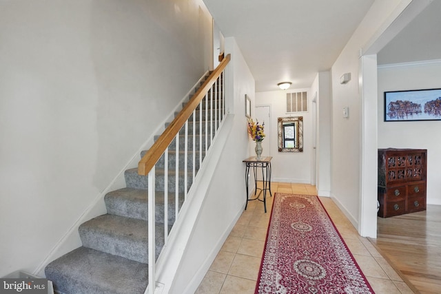 9601 Tinsmith Ln, Burke, VA 22015 - stairs featuring tile patterned floors and visible vents