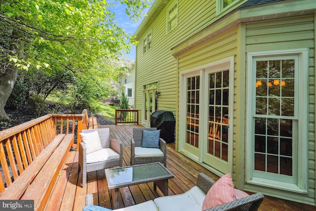 deck with grilling area and french doors