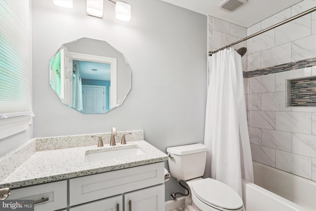 full bath featuring shower / tub combo, visible vents, toilet, and vanity