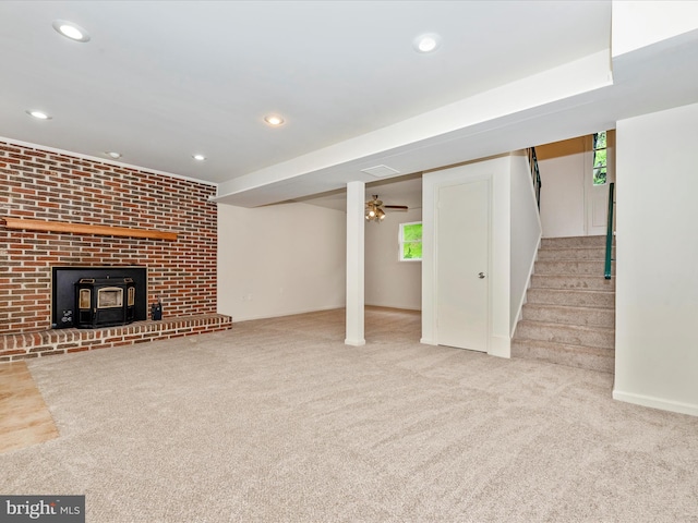 10924 Rawley Rd, New Market, MD 21774 - below grade area featuring carpet floors, stairs, recessed lighting, and a wood stove
