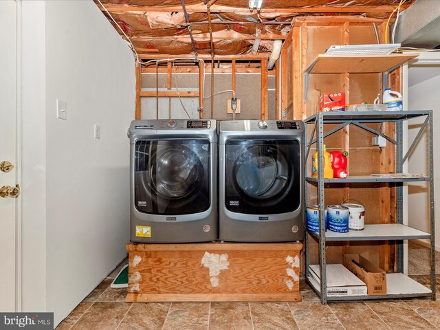 10924 Rawley Rd, New Market, MD 21774 - clothes washing area featuring washing machine and clothes dryer