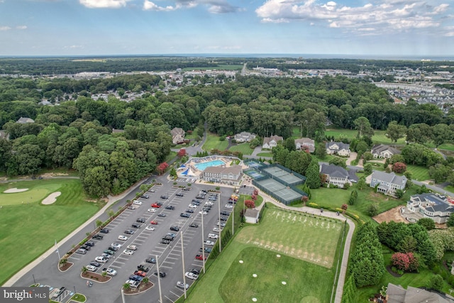 aerial overview of property's location with a golf course