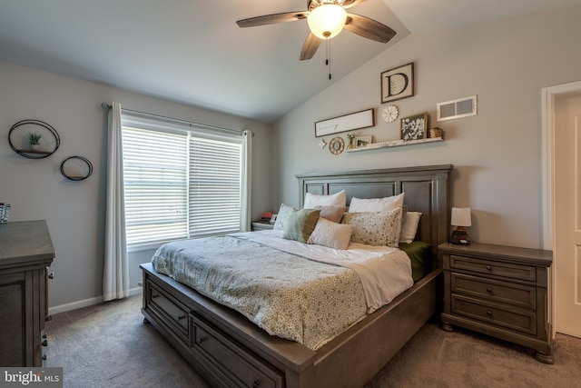bedroom with ceiling fan, carpet, baseboards, lofted ceiling, and visible vents