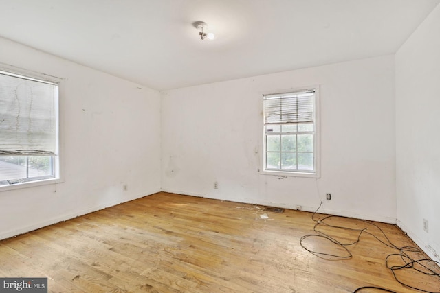 5610 Gallatin Pl, Hyattsville, MD 20781 - unfurnished room with healthy amount of natural light, wood finished floors, and baseboards