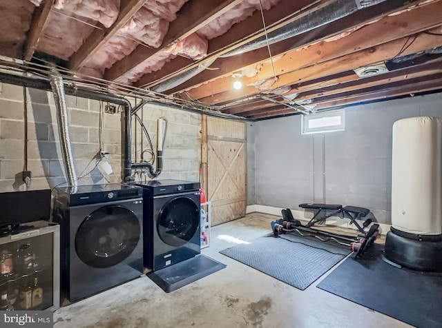 basement with washer and clothes dryer