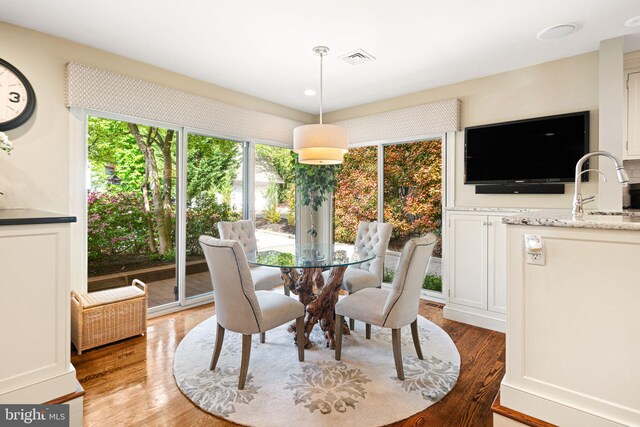 dining room featuring light wood-style flooring