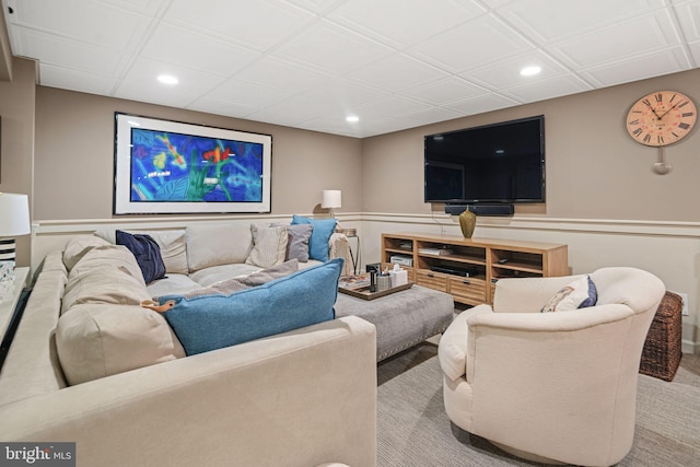 living room featuring recessed lighting and wainscoting