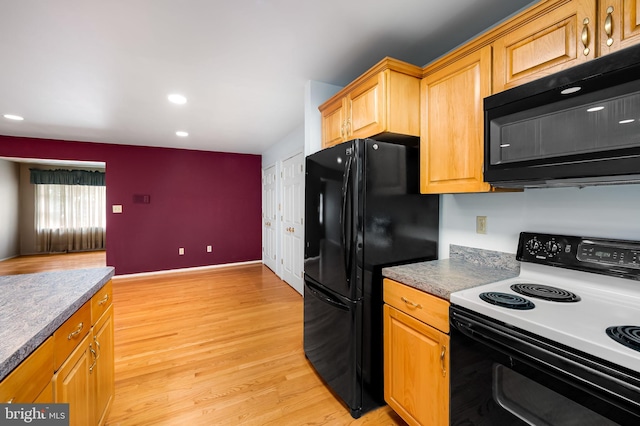 5303 Dew Garth, Baltimore, MD 21206 - kitchen with light wood-style flooring, baseboards, black appliances, and recessed lighting