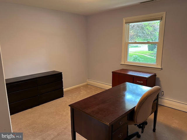 office space featuring baseboard heating, baseboards, and light colored carpet