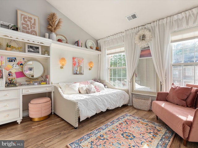 20636 Muddy Harbour Sq, Sterling, VA 20165 - bedroom with lofted ceiling and light wood-style floors