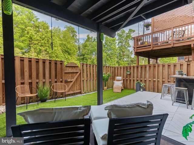20636 Muddy Harbour Sq, Sterling, VA 20165 - view of patio with an outdoor hangout area, a wooden deck, a fenced backyard, and a gate