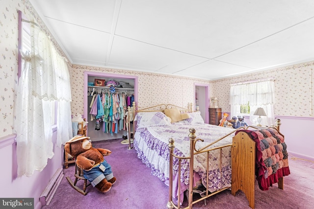 bedroom featuring carpet flooring, ornamental molding, and wallpapered walls